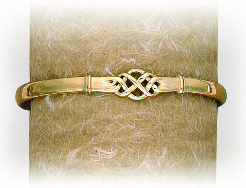 SOLID BANGLE CIRCULAR CELTIC PATTERN FEATURE